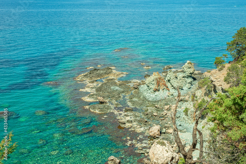 View to the Cyprus island sea coast with blue water and mountain. Akamas cape landscape