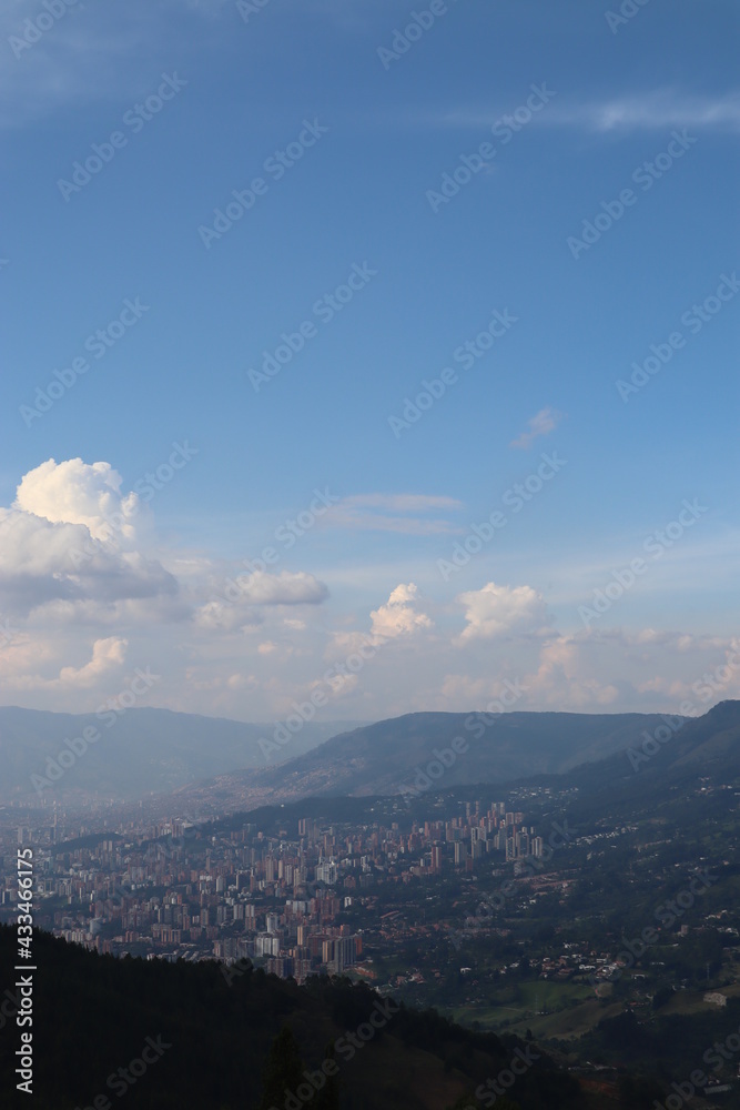 Panorama view to Medellin in Colombia South America, view from the Pablo Escobar prison in the hills around Medellin, observe in the valley the huge skyscrapers and houses from the amazing metropole 