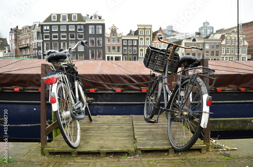 Amsterdam view with bikes and boats