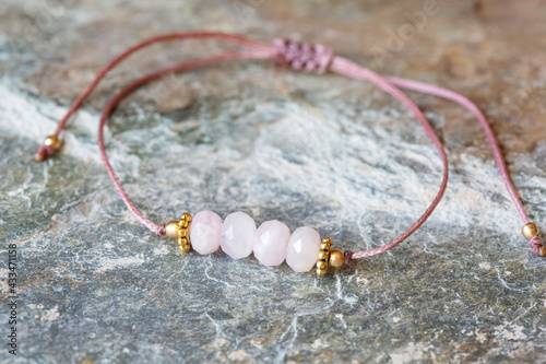 Morganite cubic cut mineral stone bead bracelet on natural background photo