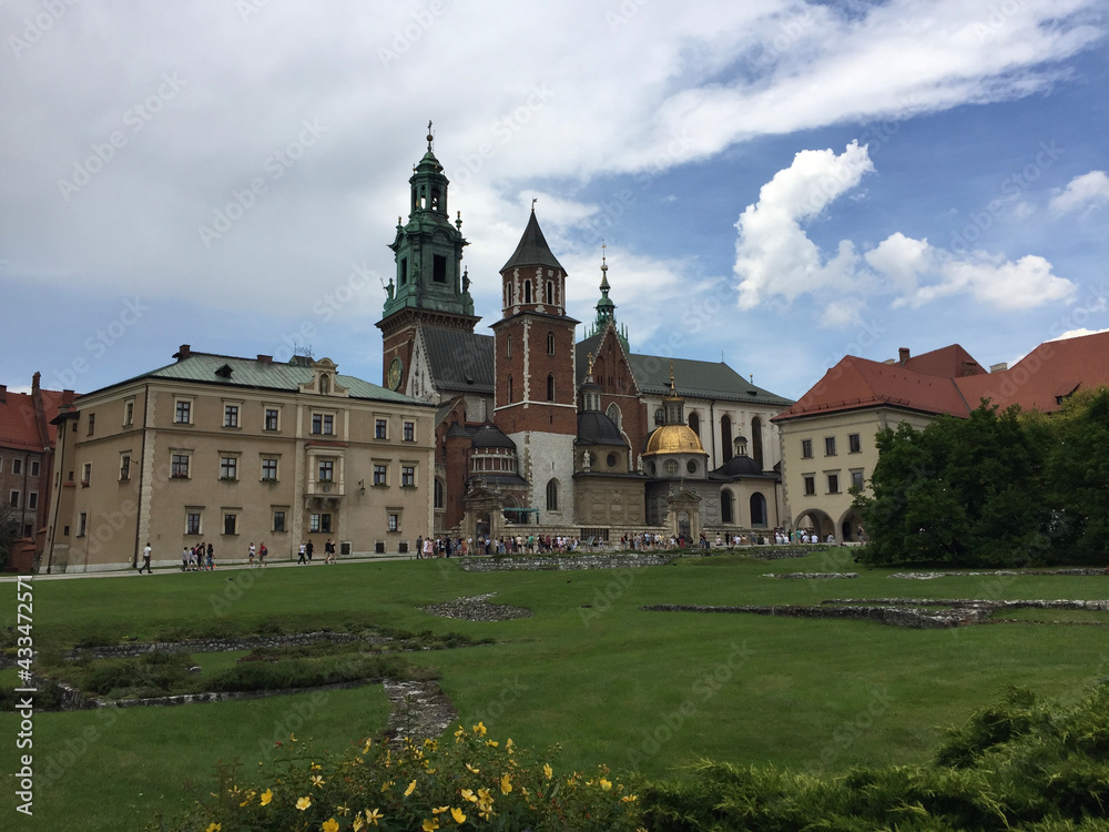 The Parish House and the Wawel Cathedral on Wawel Hill: Sigismund's Chapel (right, with a gold dome) and Vasa Dynasty chapel (to the left) in Krakow, Poland