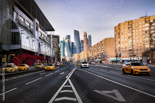 View of the skyscrapers of Moscow City in Moscow. City road. Taxi.