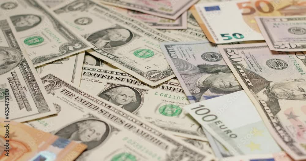 Panning from US Dollar and Euro banknotes to Bitcoin coins and Hard Drive. Bitcoin reflecting on HDD platter, concept of crypto mining and blockchain storage