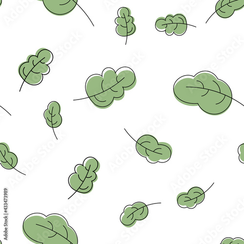 Seamless pattern with green leaves. Vector.