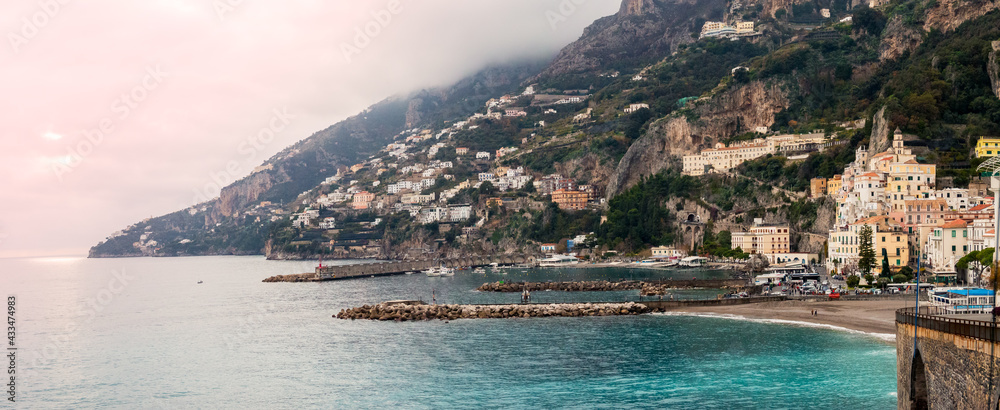 Panoramic view of beautiful Amalfi on hills leading down to coast, Campania, Italy