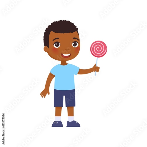 Little African happy boy smiles and holds a pink lollipop in his hand. Cartoon dark skin character