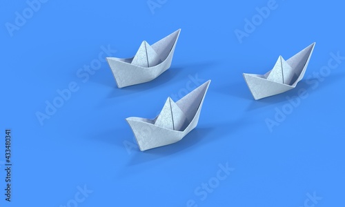 Management concept with origami boats.