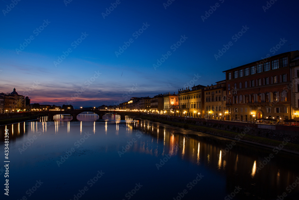 Ponte Vecchio over Arno river in Florence, Italy at blue hour after sunset.