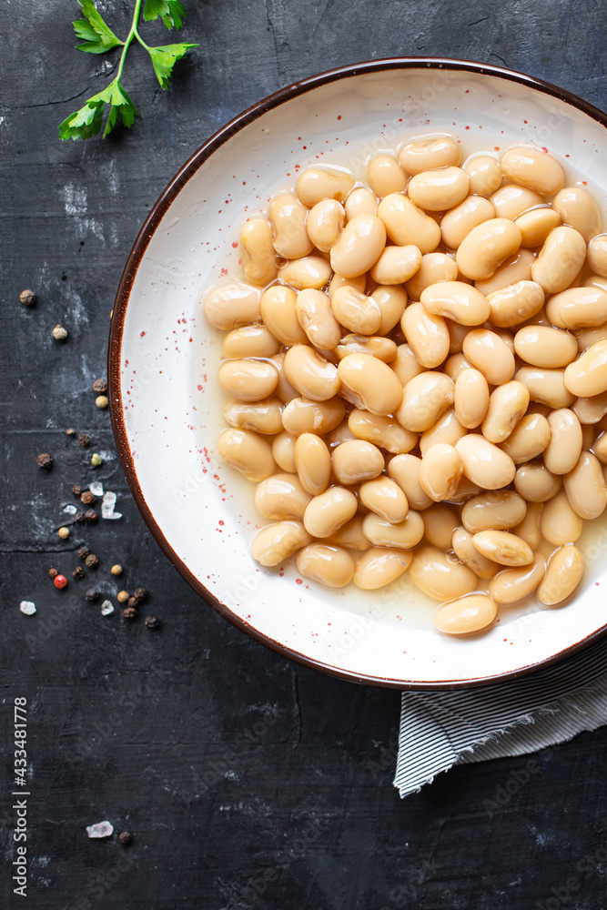 white beans cooked ready to eat beans boiled legumes on the table healthy food meal snack copy space food background rustic. top view keto or paleo diet