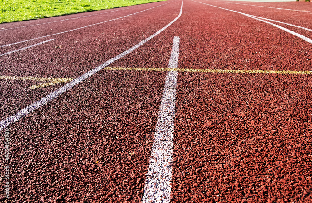 Empty stadium in the morning. Rubberized treadmills on the street. Active lifestyle, sport concept. Empty stadium in the morning. Rubberized treadmills on the street. Active lifestyle, sport concept.