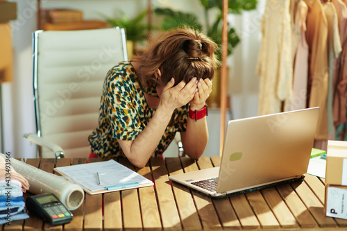 Photography stressed elegant small business owner woman in office