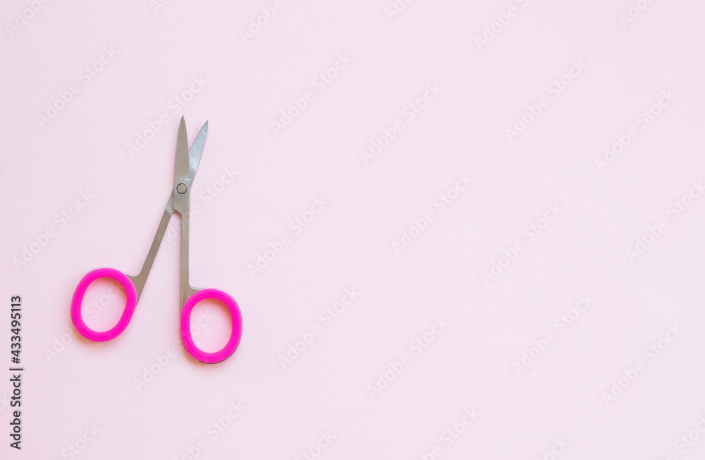 pink scissors on pink background. opy space for text pink scissors on pink background. opy space for text