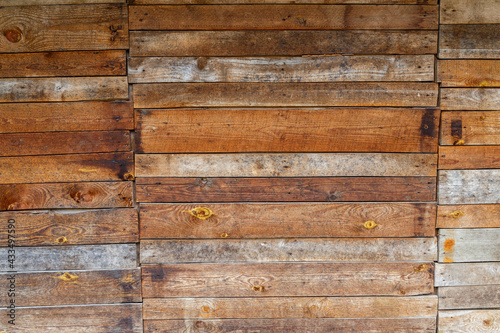 orange uncoated wooden planks wall suface texture and background photo