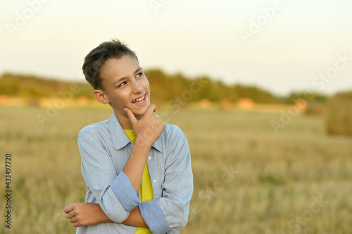 happy Boy in field enjoying nature