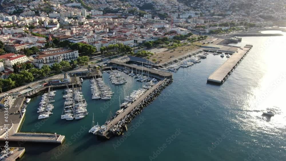 Flying over Funchal Marina and Praca do Povo on Madeira island in Portugal Flying over Funchal Marina and Praca do Povo on Madeira island in Portugal