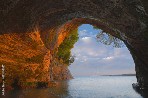 Landscape at sunrise of the interior of Cathedral Sea Cave, Grand Island, Lake Superior, Michigan’s Upper Peninsula, USA