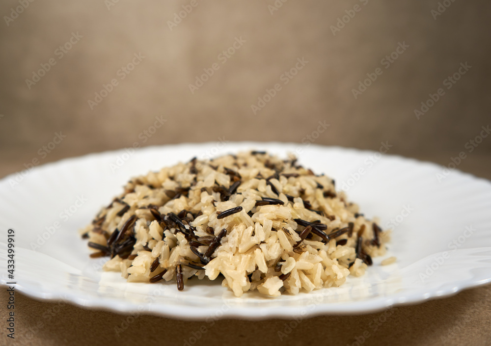 Black and brown rice on the plate Black and brown rice on the plate
