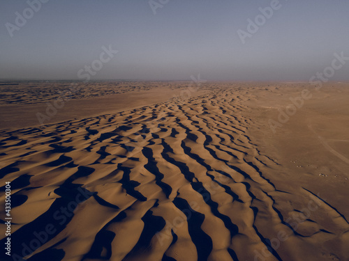 Desert Sand Dunes in the Dubai - UAE  taken at late afternoon showing the contrast in shadows and highlights on the dunes