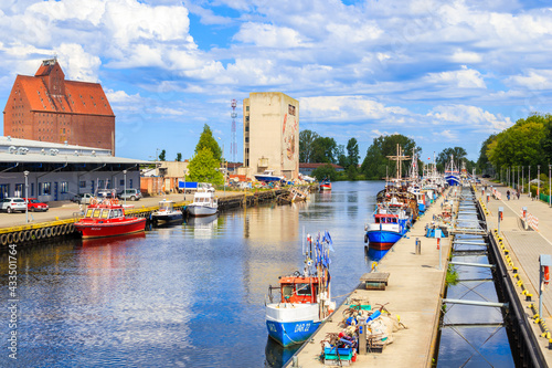 DARLOWO PORT, POLAND - JUN 2, 2020: Fishing boats anchoring in Darlowo port l...