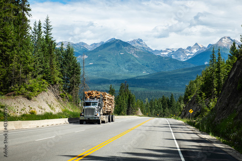 Timber truck on mountain highway in British Columbia
