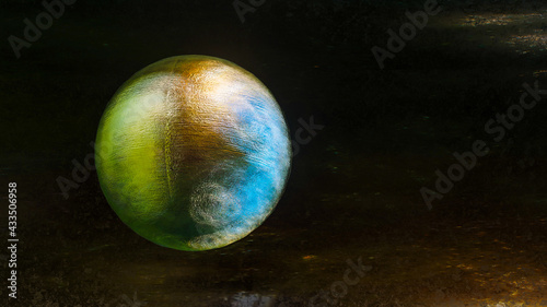 metallic silver sphere with a rough texture on a black background. 3d render illustration © toomler