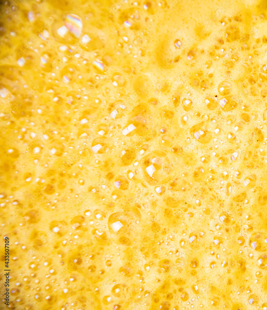 Traditionnal golden latte in a white mug Traditionnal golden latte in a white mug