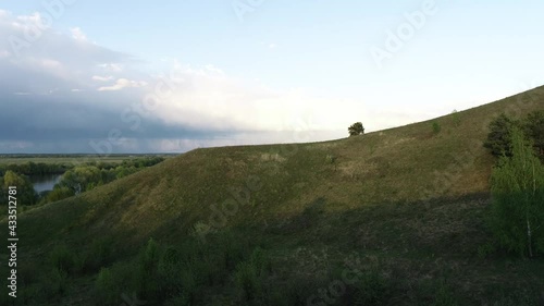 View of the Oka River near the village of Konstantinovo, Ryazan Region on a quiet spring evening photo