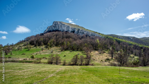 Jagged peak of Stol mountain in eastern Serbia, near the city of Bor photo