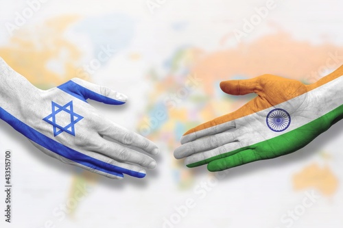 Israel and India - Flag handshake symbolizing partnership and cooperation