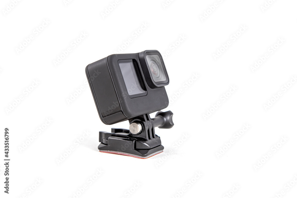 New 4K action camera on a suction mount in black color. Isolated white background New 4K action camera on a suction mount in black color. Isolated white background