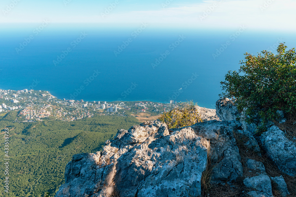 view from the top of Ai-Petri of the Crimean mountains to the resort town of Yalta on the Black Sea coast