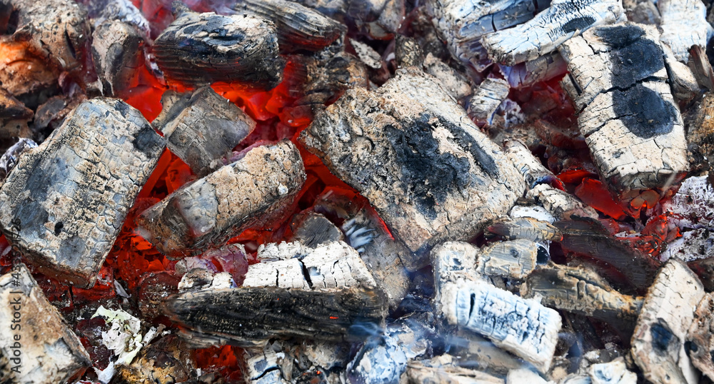 Smouldering coal for preparing grilled food. Background. Smouldering coal for preparing grilled food. Background.