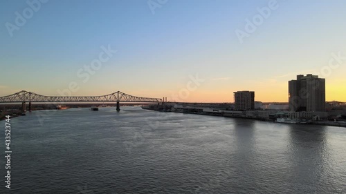 Crescent City Connection Bridge Pan to View of New Orleans Louisiana Downtown Sunset Aerial