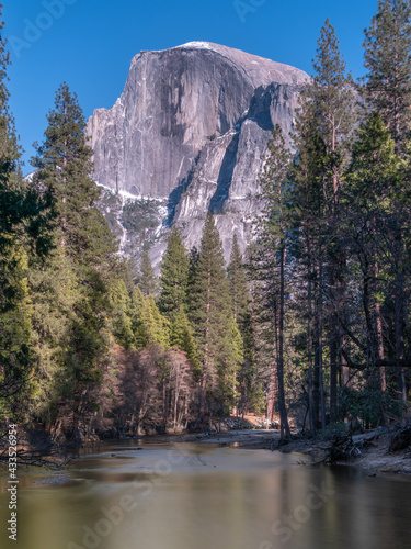 long exposure shot of half dome and merced river in yosemite national park