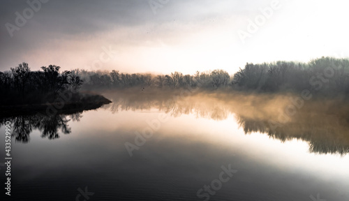 Clouds Of Mist Over The Watershed Of National Park River Danube Wetlands In Austria © grafxart