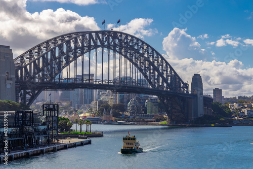 View if Sydney Harbour of buildings bridges & ferries. Picture taken from Cahill Expressway Circular Quay NSW Australia