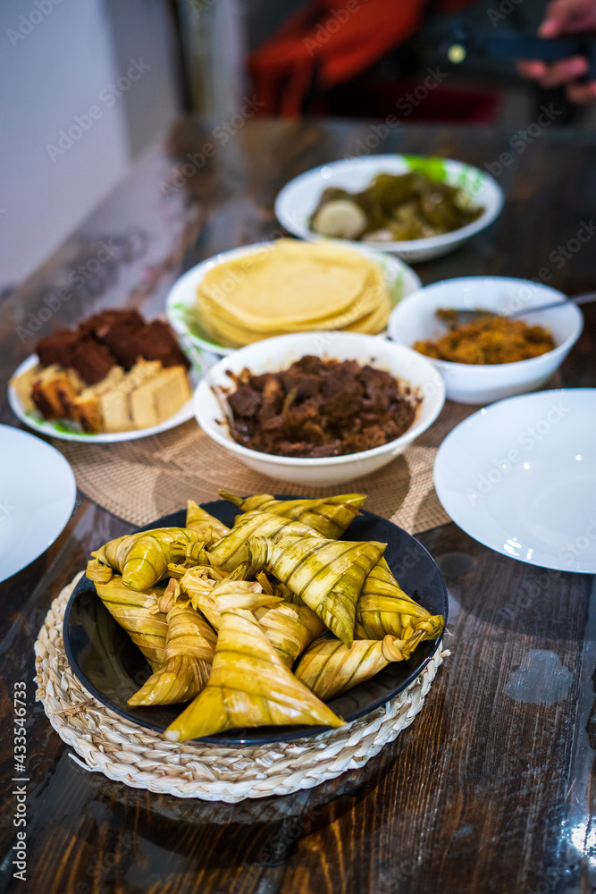 Traditional Malay Food and cookies during Ramadan and Eid Mubarak. Hari Raya Aidilfitri. Ketupat, rendang, lemang, dodol, biskut.