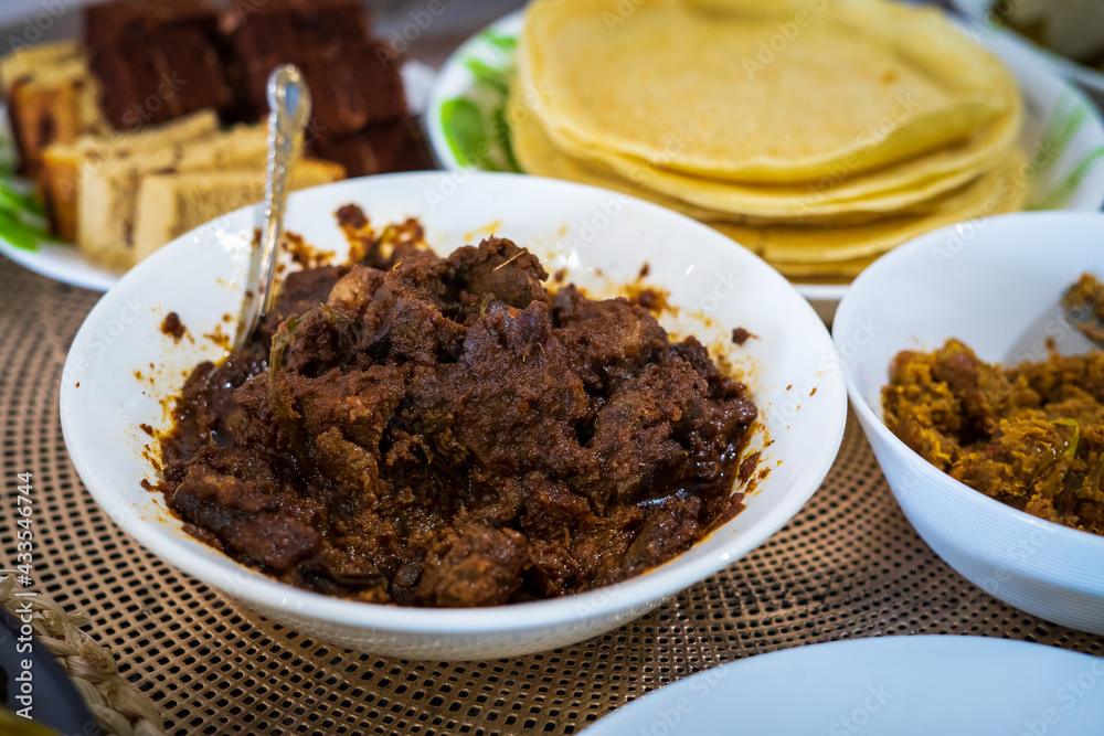 Rendang is a traditional Malaysian spicy meat that slow cooked in coconut milk and mixed spices, served during festive events like wedding, Eid Al Fitr and Eid Al Adha. Rendang is a traditional Malaysian spicy meat that slow cooked in coconut milk and mixed spices, served during festive events like wedding, Eid Al Fitr and Eid Al Adha.