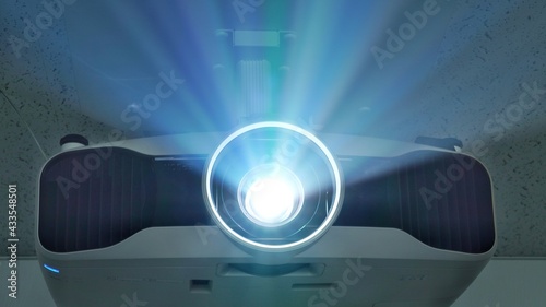 Foto Streaks of light coming from the projector.