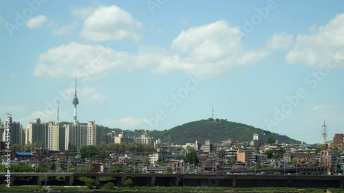 Cityscape of Namsun  N Seoul Tower and Yongsan-gu  District around N Seoul Tower (Landmark building of Seoul) at bright day Seoul, South Korea photo