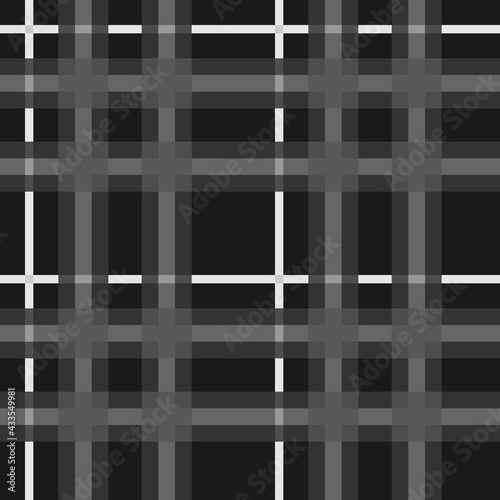 Traditional British seamless pattern known as tartan in black, gray, white.