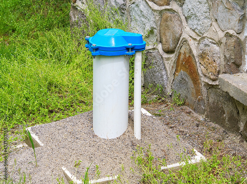 External casing and cap of a private home water well