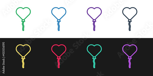 Set line Balloons in form of heart with ribbon icon isolated on black and white background. Valentines day. Vector