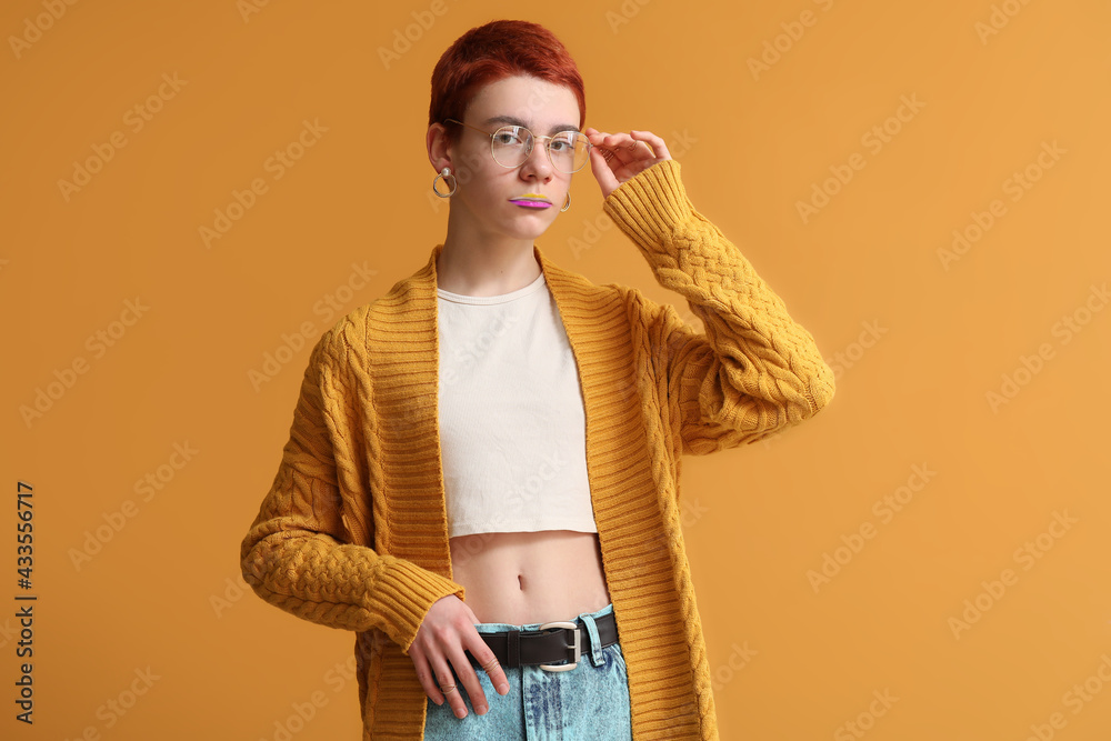 Non-binary teenager on color background - obrazy, fototapety, plakaty 