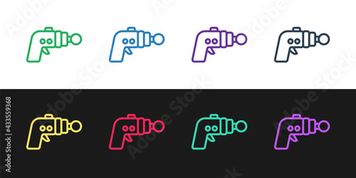 Set line Ray gun icon isolated on black and white background. Laser weapon. Space blaster. Vector
