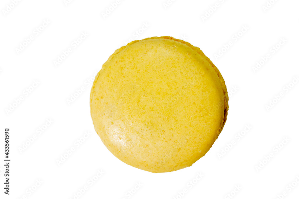 Lemon flavor homemade yellow macaron isolated on a white background, top view