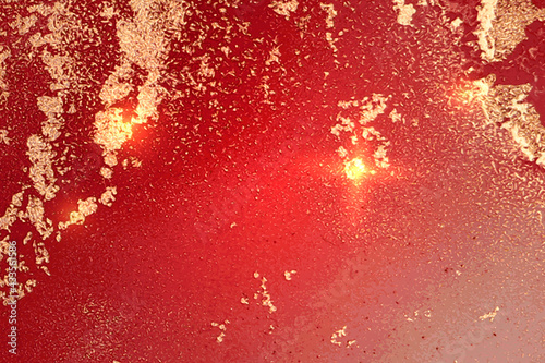 Abstract gold and raspberry red marble texture with sparkles. Vector background in alcohol ink technique. Modern paint with glitter. Template for banner, poster design. Fluid art painting