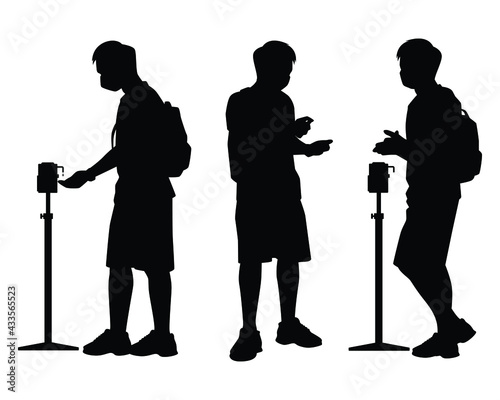 Young man with alcohol sanitizer for coronavirus protection silhouette vector on white background