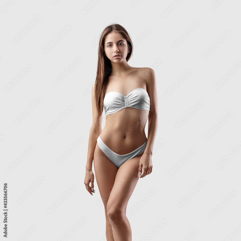 White bikini mockup for design on sexy girl isolated on background, front view White bikini mockup for design on sexy girl isolated on background, front view