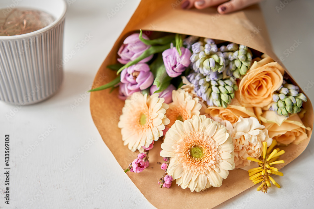 Unpacking Flowers bunch, set for home. Fresh cut flowers for decoration home. European floral shop. Delivery fresh cut flower. Unpacking Flowers bunch, set for home. Fresh cut flowers for decoration home. European floral shop. Delivery fresh cut flower.